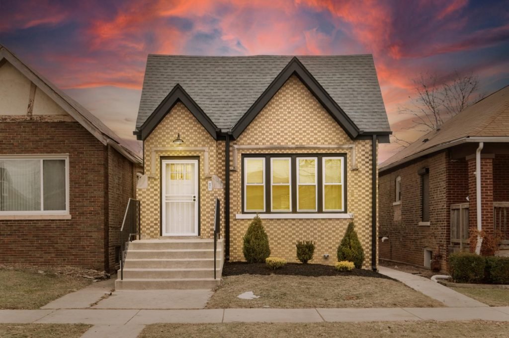 Sold home at 10229 S Aberdeen St, Chicago, a checkerboard-brick bungalow with two gables